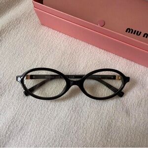 Miu Miu Black Oval glasses